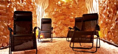 People swear by salt therapy also known as holotherapy. What can a glowing pink room full of salt do for you? Find out in this article.