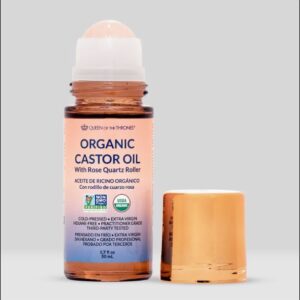 Queen of the Thrones Castor Oil Belly Button Roll-On with rose quartz applicator.