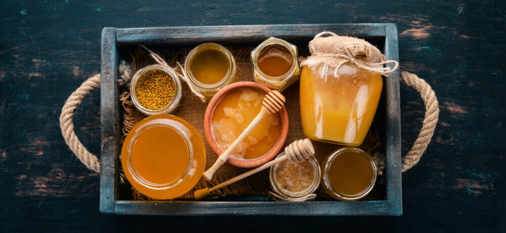 honey in a wooden tray